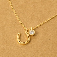 horseshoe ketting goud/zilver klein