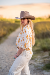 The Buckaroo pearl snap blouse